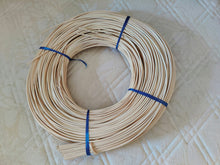 Load image into Gallery viewer, Top view of a 1 kg coil of 3 mm round rattan centre cane