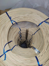 Load image into Gallery viewer, Close-up of a coiled bundle of 3 mm round rattan core